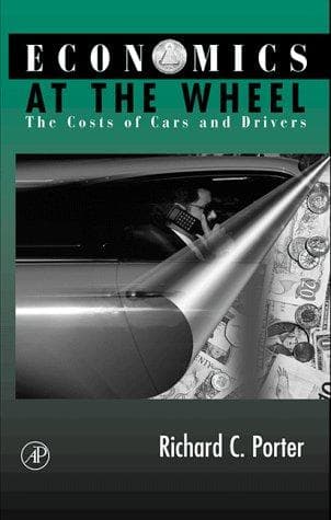 Cover of Economics at the wheel by Richard C. Porter