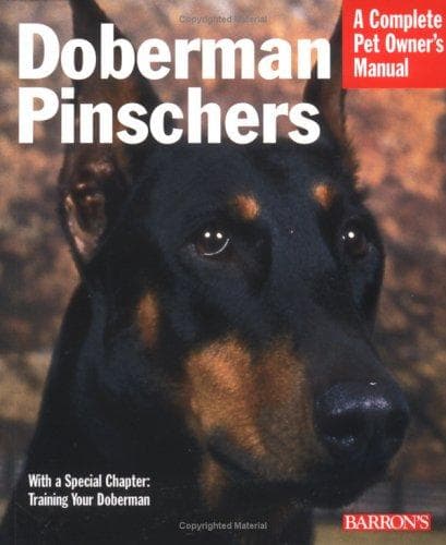 Cover of Doberman Pinschers by Raymond Gudas