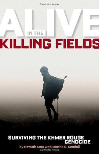 Cover of Alive in the killing fields by Nawuth Keat