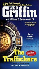 Cover of The traffickers by William E. Butterworth III