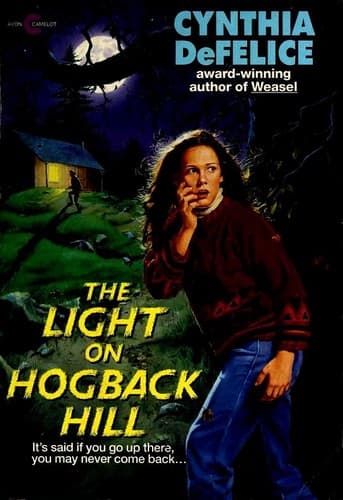 Cover of The light on Hogback Hill by Cynthia C. DeFelice